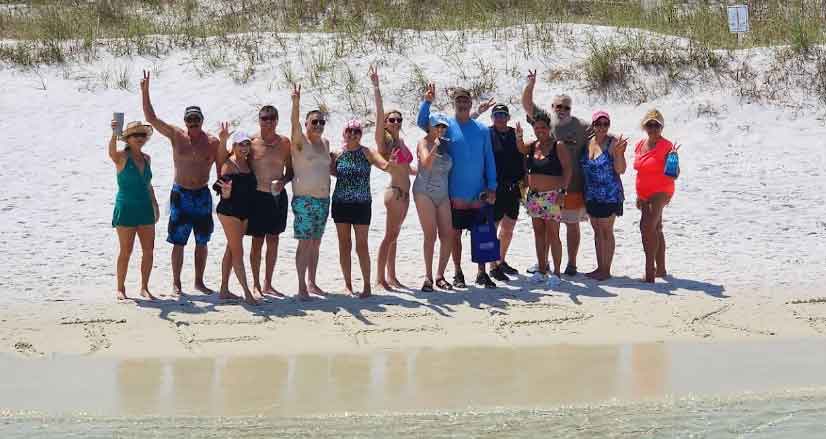 Family enjoying a sunny day at Shell Island near Panama City Beach