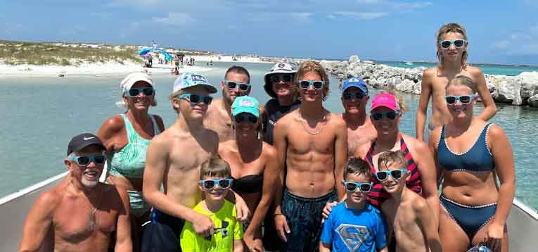 A family enjoying a Shell Island boat tour near Panama City Beach